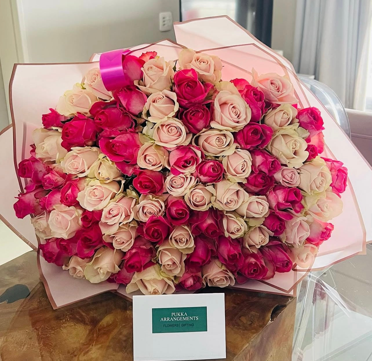 100 mixed roses