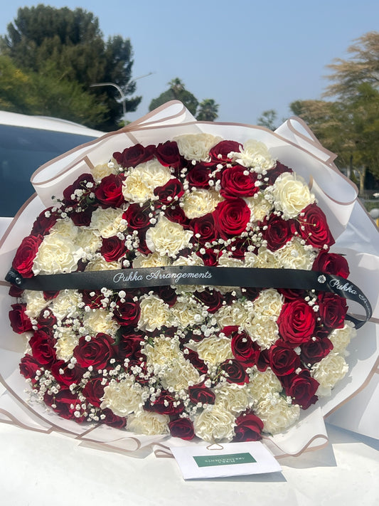 Red roses, carnations and gyp